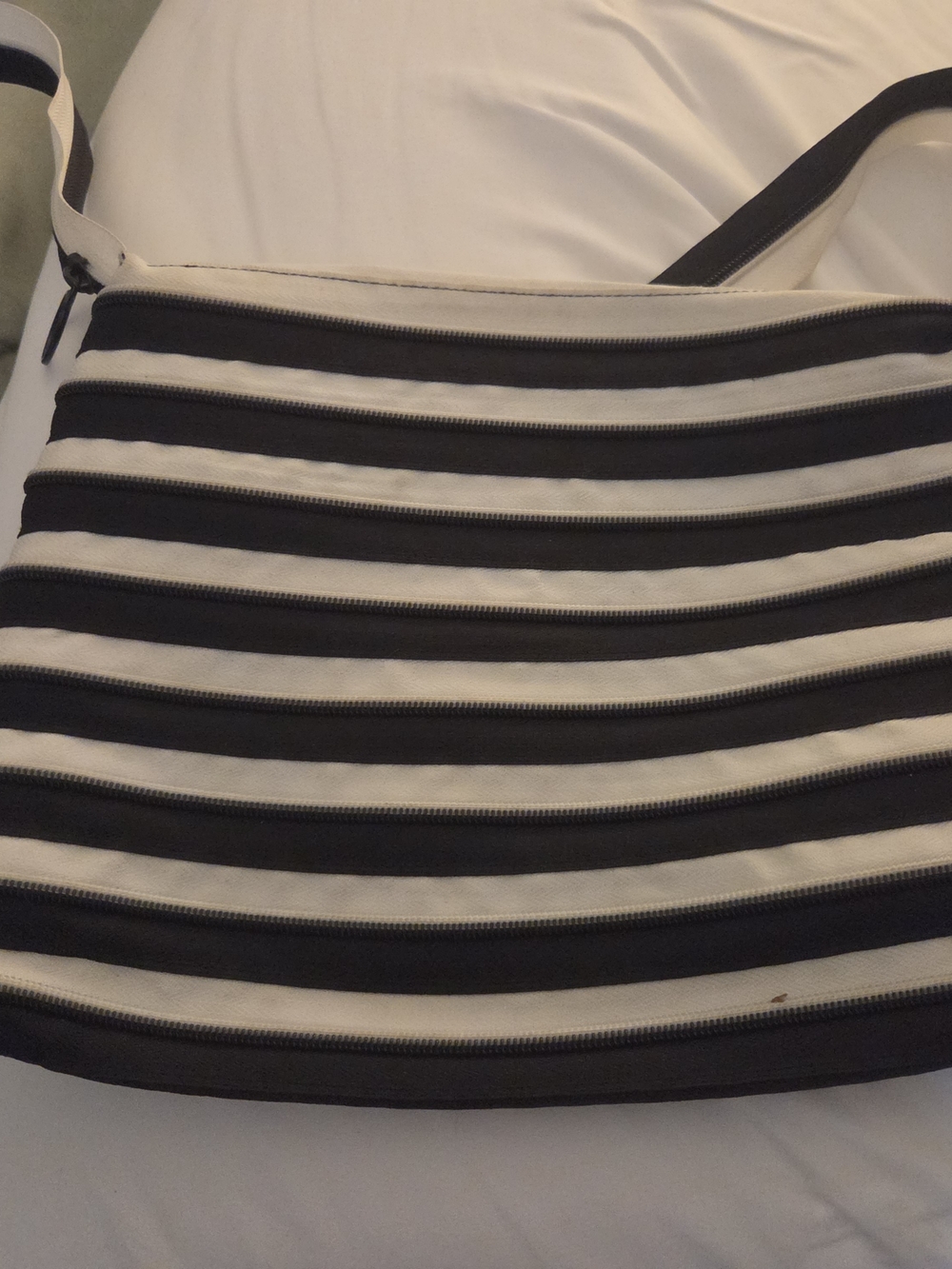 Black and White Striped Crossbody Bag with Zipper Detail